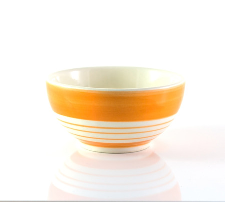 Colorful ceramic bowl on white backgroundの写真素材