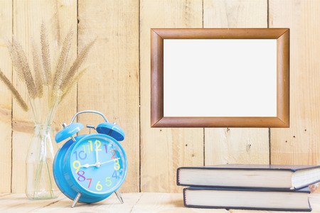 Color pencils and book on wooden background - Vintage effect style picturesの写真素材