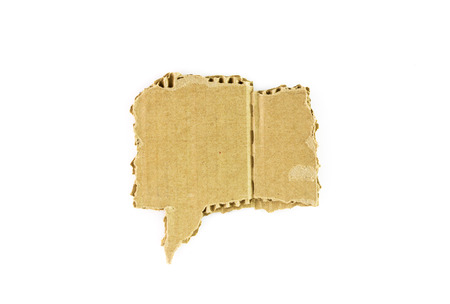 Textured striped cardboard with torn, speech bubble isolated on white backgroundの写真素材