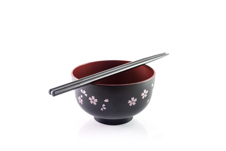 Chopsticks in asian set table isolated on whiteの写真素材