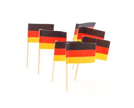 German flag in toothpick against white backgroundの写真素材