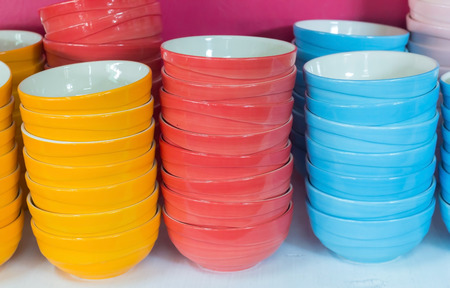 A lot of colorful bowls in a shopの写真素材