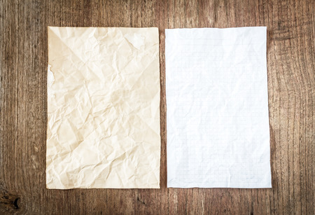 white paper on wooden tableの写真素材