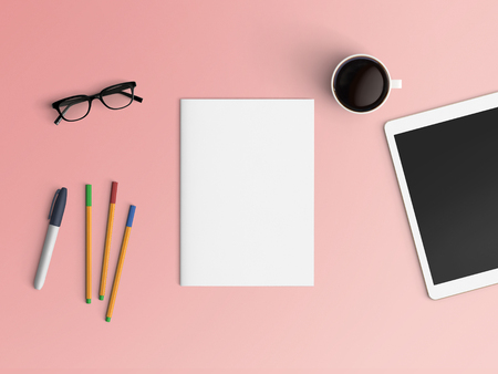 Minimal office desk workplace with notebook, tablet or smartphone, coffee cup, pen and eyeglasses copy space on color background. Top view. Flat lay style.の写真素材