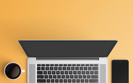 Modern workspace with laptop, coffee cup and smartphone copy space on color background. Top view. Flat lay style.の写真素材