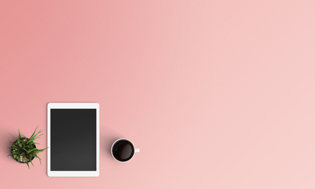 Minimal workplace with tablet, tree and coffee cup copy space on color background. Top view. Flat lay style.の写真素材