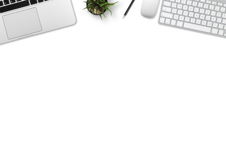 Modern workplace with notebook, keyboard, smartphone, tree and pencil copy space on gray background. Top view. Flat lay style.の写真素材