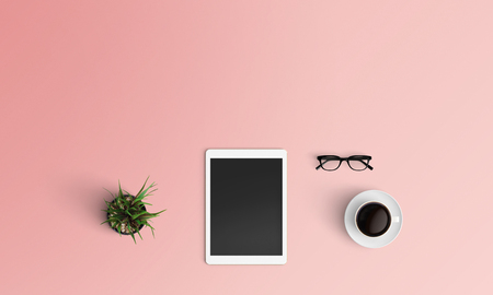 Minimal workplace with tablet, coffee up and eyeglasses copy space on color background. Top view. Flat lay style.の写真素材