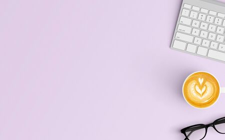 Modern workspace with coffee cup and keyboard copy space on purple color background. Top view. Flat lay style.の写真素材