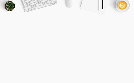 Modern workspace with coffee cup, smartphone, paper, notebook, tablet and keyboard copy space on...