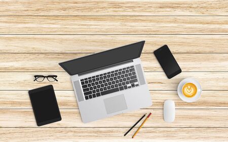 Modern workspace with coffee cup, paper, notebook, tablet or smartphone and laptop copy space on...
