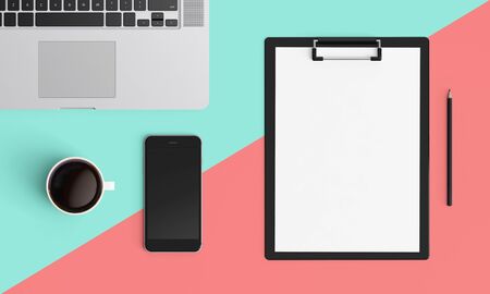 Modern workplace with notebook or laptop, coffee cup and smartphone copy space on color background. Top view. Flat lay style.の写真素材