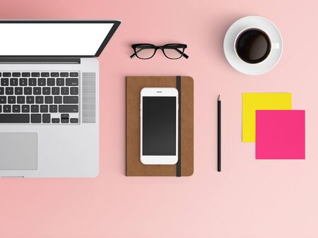 Modern workspace with laptop, coffee cup, notepad, notebook and smartphone copy space on color background. Top view. Flat lay style.の写真素材