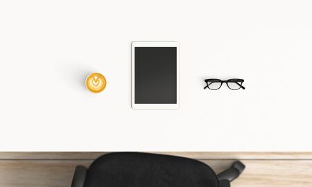 Modern workplace with coffee cup and smartphone or laptop copy space on office table background. Top view. Flat lay styleの写真素材