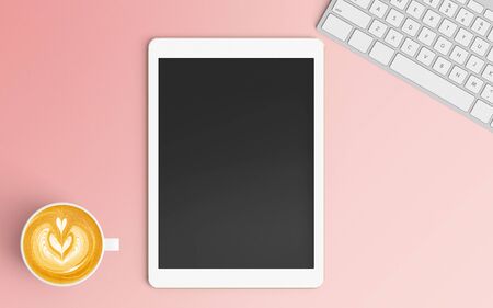 Modern workspace with coffee cup, keyboard and tablet copy space on pink color background. Top view. Flat lay style.の写真素材