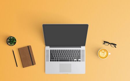 Modern workspace with coffee cup, notebook, smartphone and laptop copy space on orange color background. Top view. Flat lay style.の写真素材
