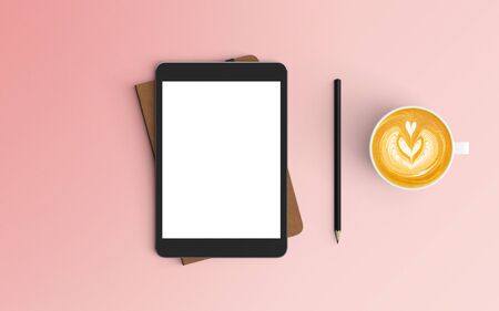 Modern workspace with coffee cup, notebook and tablet copy space on pink color background. Top view. Flat lay style.の写真素材
