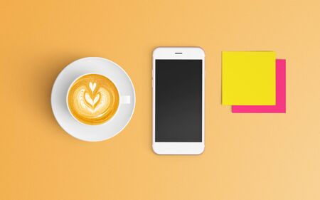 Modern workspace with coffee cup and smartphone copy space on orange color background. Top view. Flat lay style.の写真素材