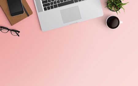 Modern workspace with laptop, coffee cup, notebook and smartphone copy space on color background. Top view. Flat lay style.の写真素材