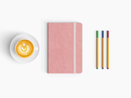 Modern office desk workplace with notebook diary, coffee cup, pencil and smartphone copy space on white desk background. Top view. Flat lay style.の写真素材