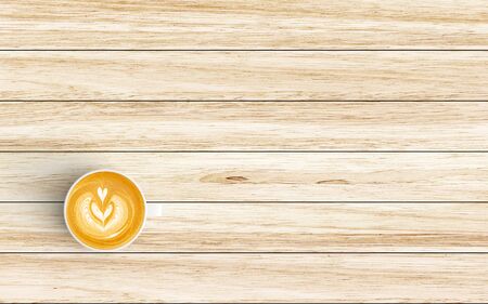 Modern workspace with coffee cup copy space on wood background. Top view. Flat lay style.の写真素材