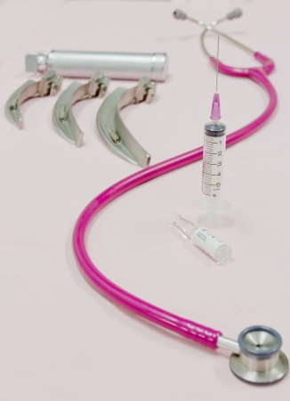 A stethoscope with syringe , vaccine and anesthesia tool closeupの写真素材