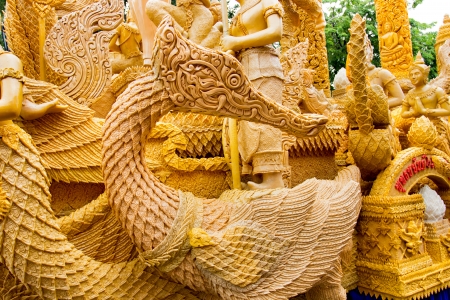 A beautiful swan made with candle in  thai candle festival of buddha  in nakhon Ratchasima city, thailand.のeditorial素材