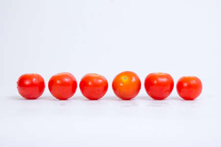 tomato on white surface の写真素材