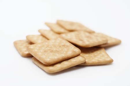 Stack of cracker on white background の写真素材