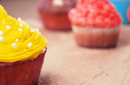 Sweet easter christmas birthday cakes on the wooden tableの写真素材