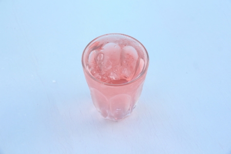 Pink Cold Water with Ice, Rising Water Solution の写真素材