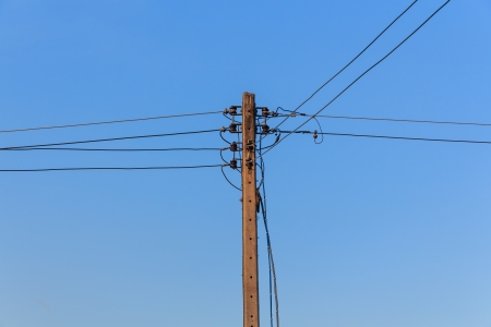 Energy and Technology, Electrical Post with Power Line Cables の写真素材