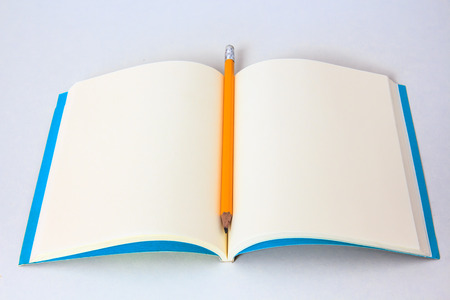 Pencil on Blank Notebook の写真素材