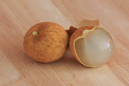 Longan on Wooden Table.の写真素材