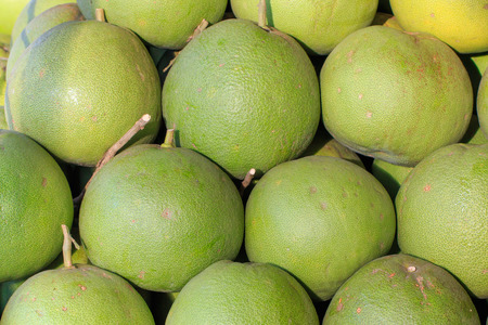 Green grapefruit at market.