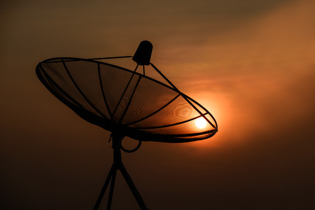 Satellite Dish on the Roof at Sunrise.の写真素材