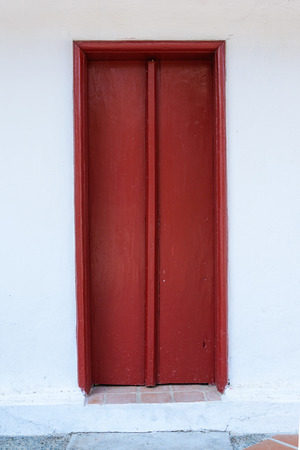 Red vintage wooden doors.の写真素材