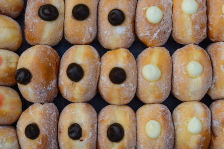 Sweet donuts in market bakery.の写真素材
