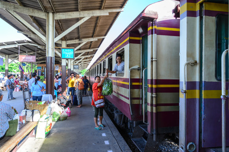 BANGKOK - July 11: Unidentified woman monger deliver vegetables by rail freight on July 11, 2015 in Bangkok, Thailand.のeditorial素材