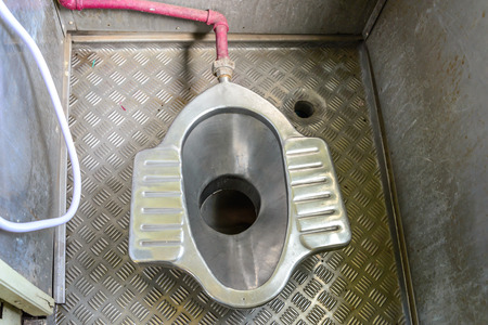 Toilet flush stainless in train.の写真素材