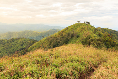Mountains and Jungle with Mist in Foggy Weather in (Khao Chang Puak) Thailand.の写真素材