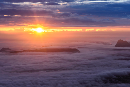 Morning mist with mountain at sunrise in Phu Kradueng national park ,Loei Thailand.の写真素材