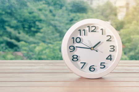 Modern alarm clock with sunlight in afternoon.