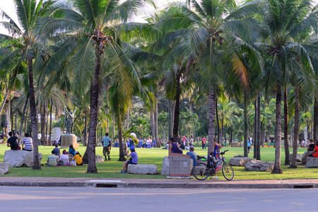 BANGKOK, THAILAND - 2016 March 06: Many peoples relaxing in urban park in weekend day in Bangkok, Thailand.のeditorial素材