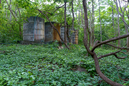 Cement circle pond for water staorage from natural.の写真素材