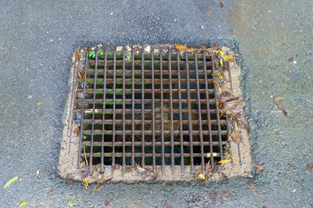 Drainage water on the road.の写真素材