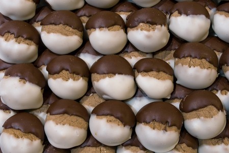 Chocolate chip cookies cooling on a cooling rack after bakingの写真素材