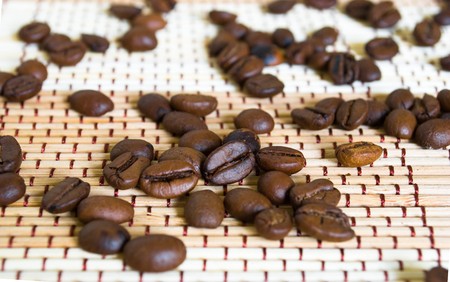 Fresh coffe beans background. Macro