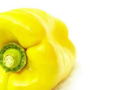Isolated fresh yellow pepper closeupの写真素材