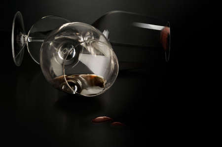 Couple of glasses of valuable red wine having a dateの写真素材